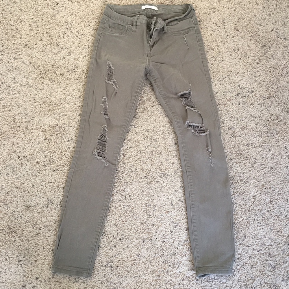 Green ripped skinny jeans